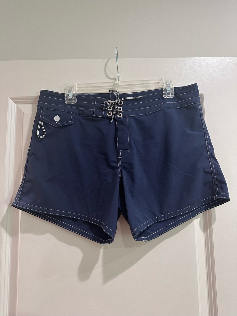Birdwell Navy Swim Shorts with White Stitching and Red Logo Patch